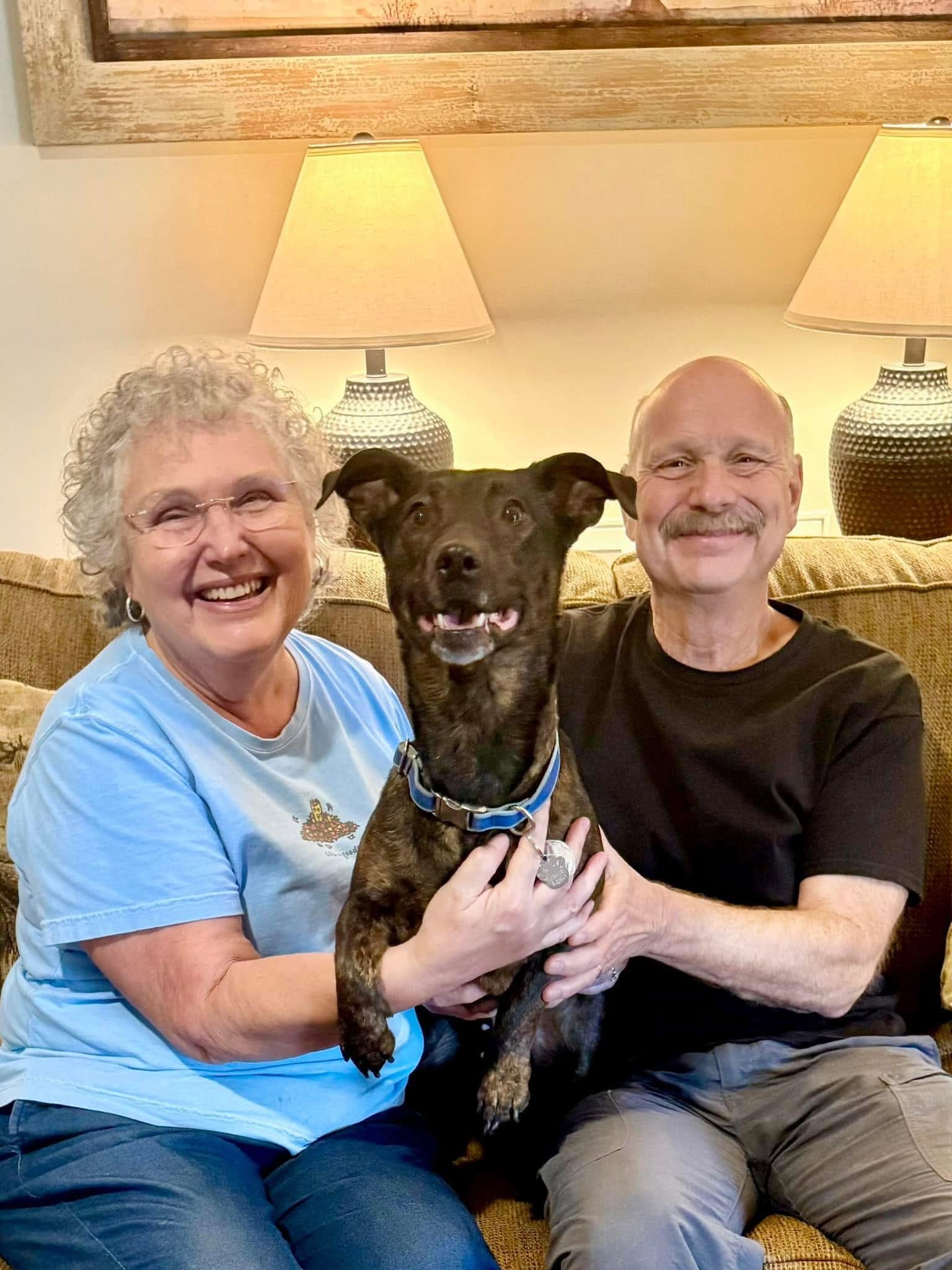 Hazel with her adopted parents